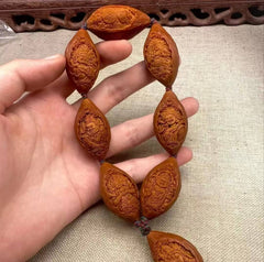 THE EIGHT TREASURES — HAND-CARVED GUARDIAN BRACELET